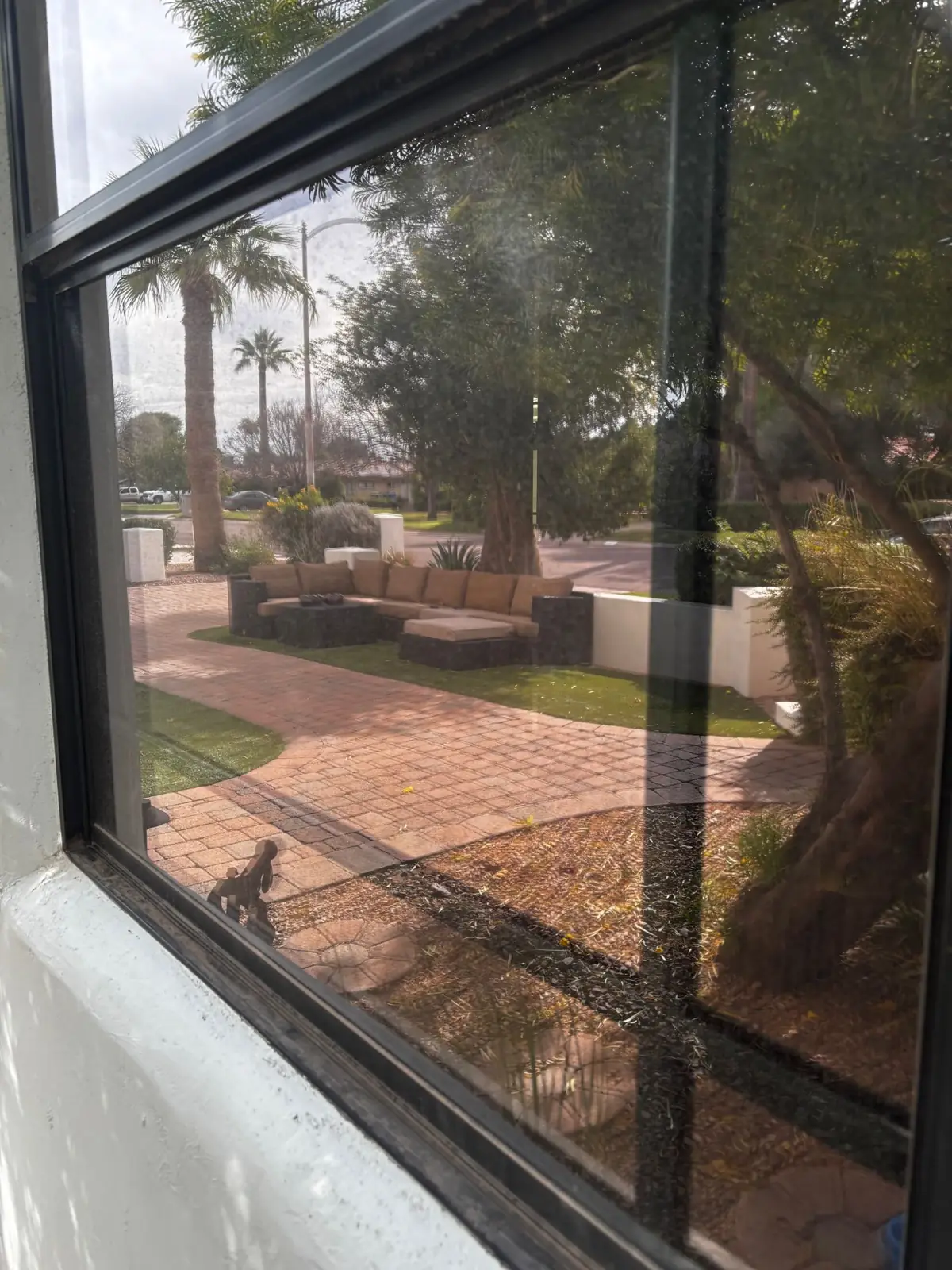 Window with water spots before cleaning